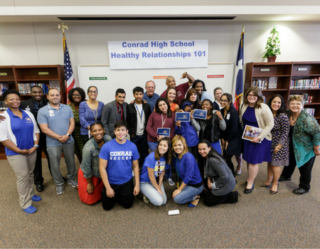 Group picture of Conrad High School students and teachers